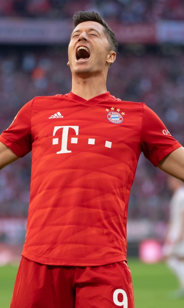 Lewandowski record as Bayern moves top in Bundesliga